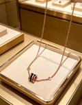 Bvlgari Rose Gold Black Accent Circle Pendant Necklace – Elegant Luxury Jewelry